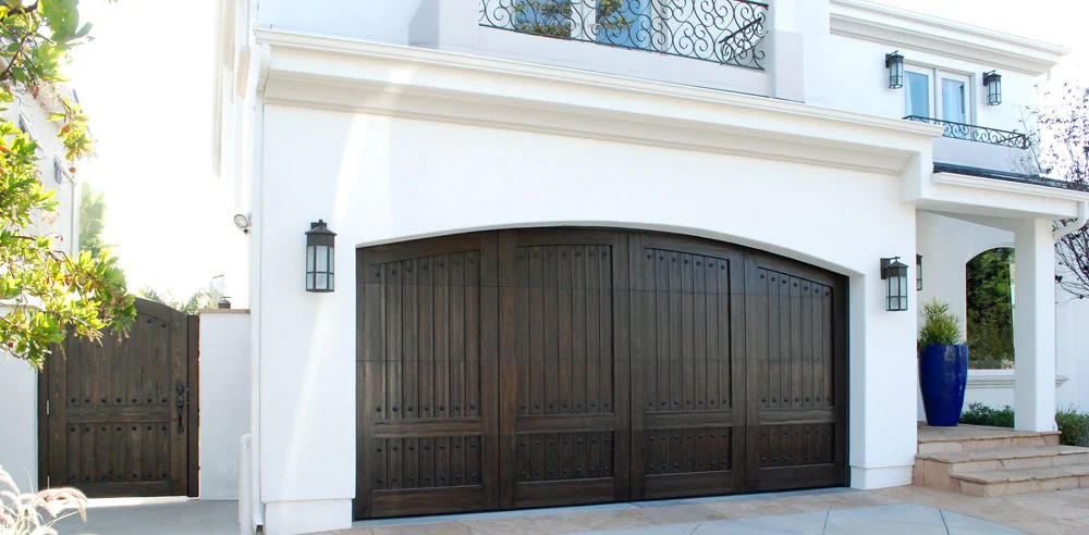 Caprice - Spanish Style Custom Wood Garage Door - Image 4