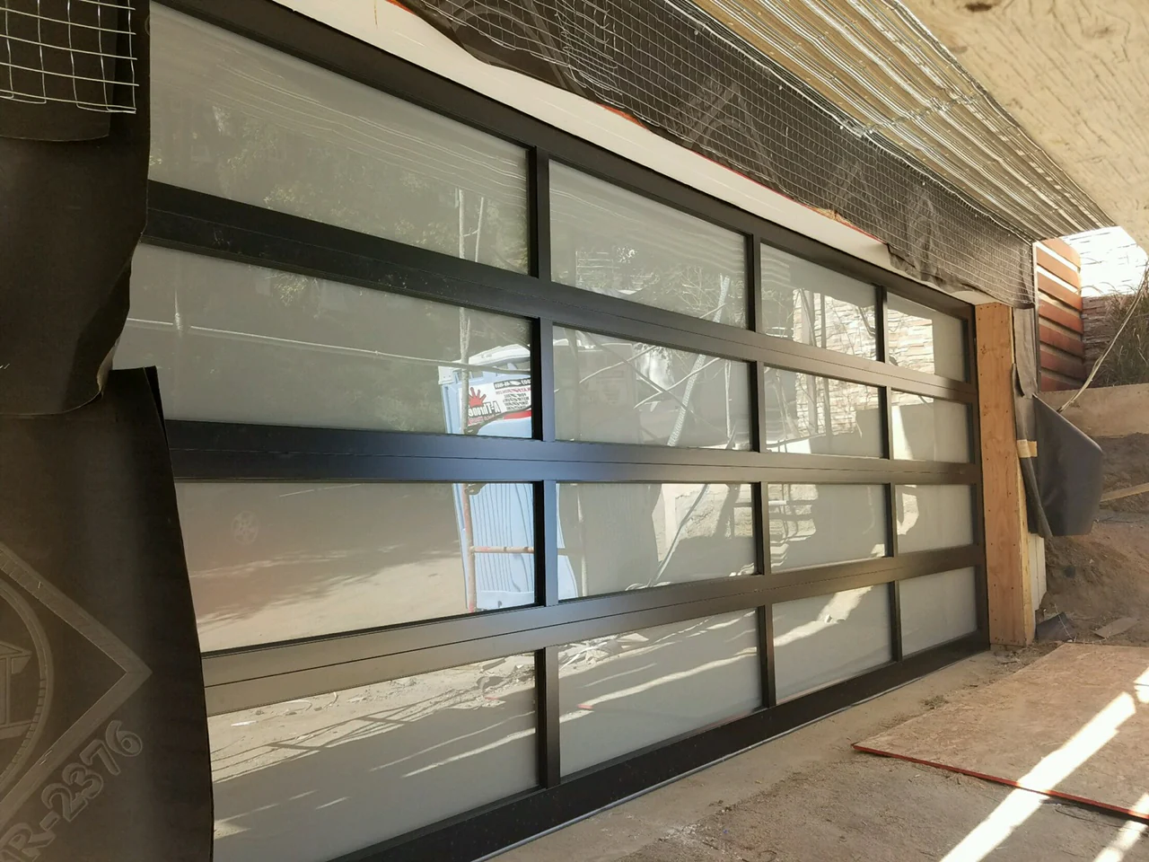 Contemporary Black Aluminum & White Laminate (Privacy) Glass Garage Door - Image 10