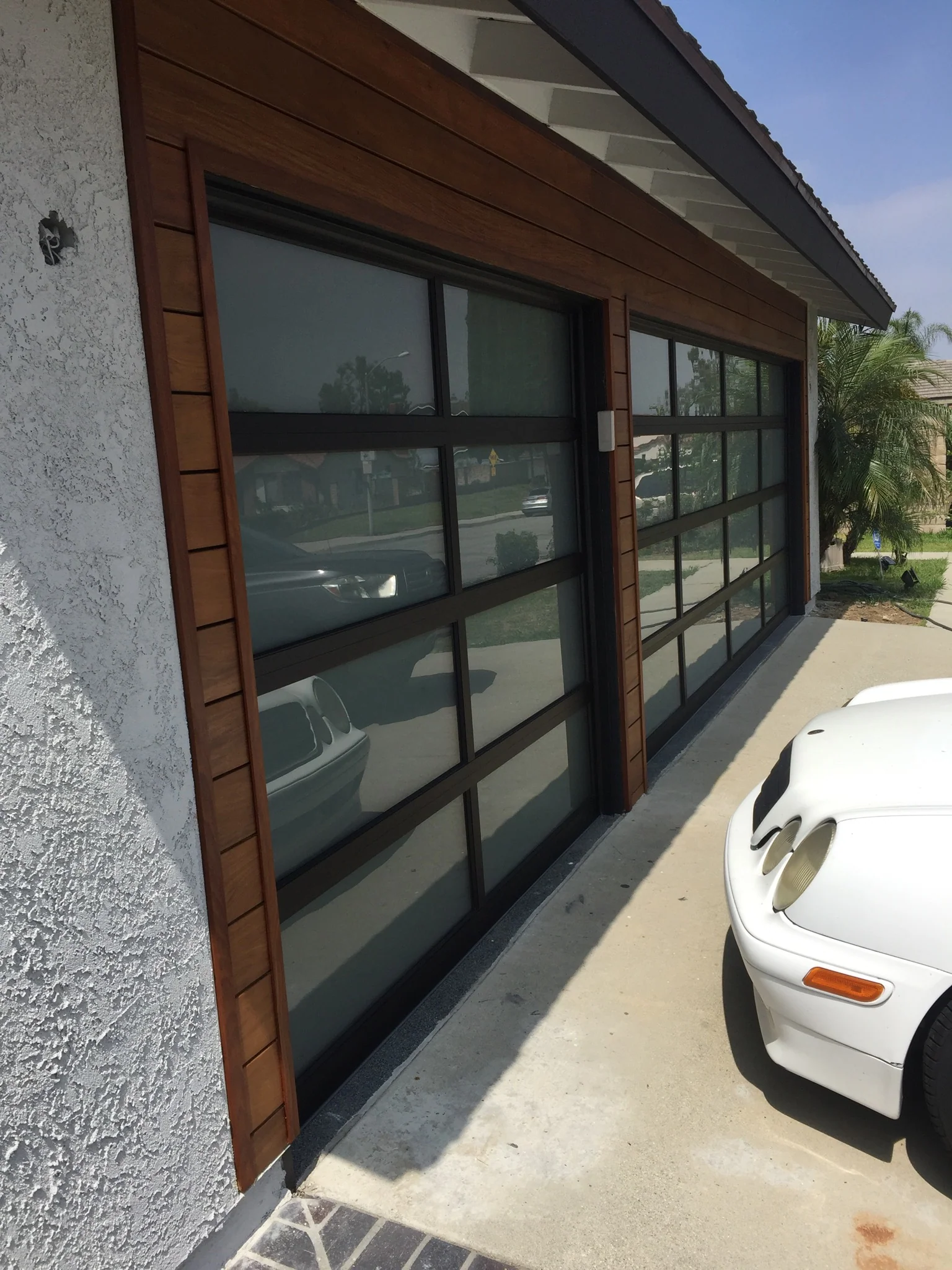 Contemporary Black Aluminum & White Laminate (Privacy) Glass Garage Door - Image 4