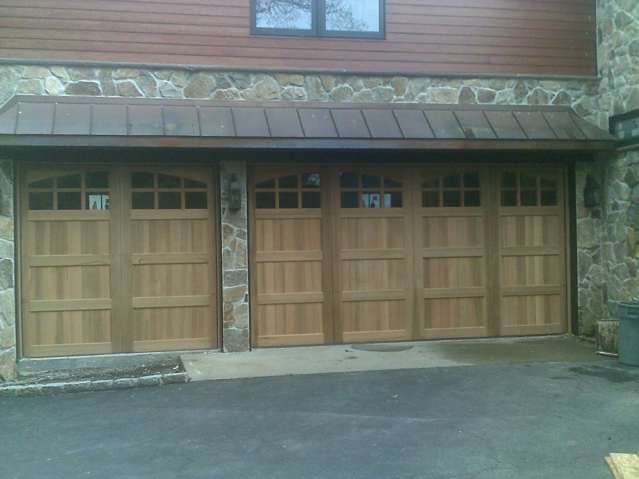 Montage - Spanish Style Custom Wood Garage Door - Image 8