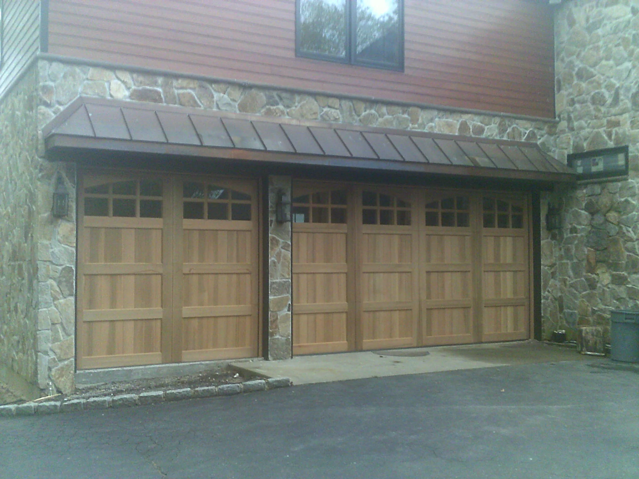 Montage - Spanish Style Custom Wood Garage Door - Image 9