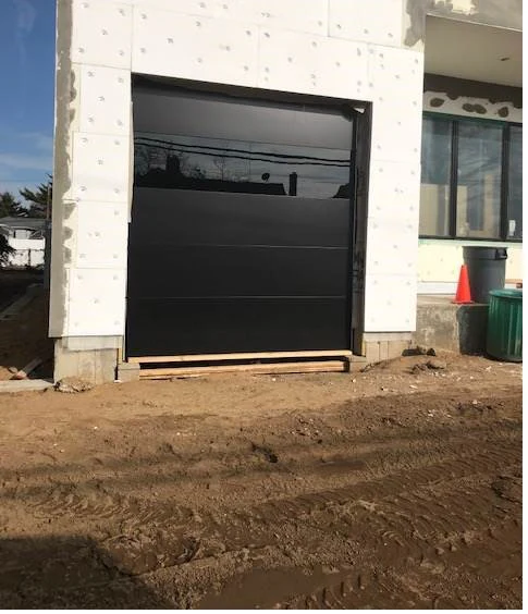 Infinity - Flush Panel Smooth Steel Garage Door with Horizontal Modern Glass Modern Design - Image 11