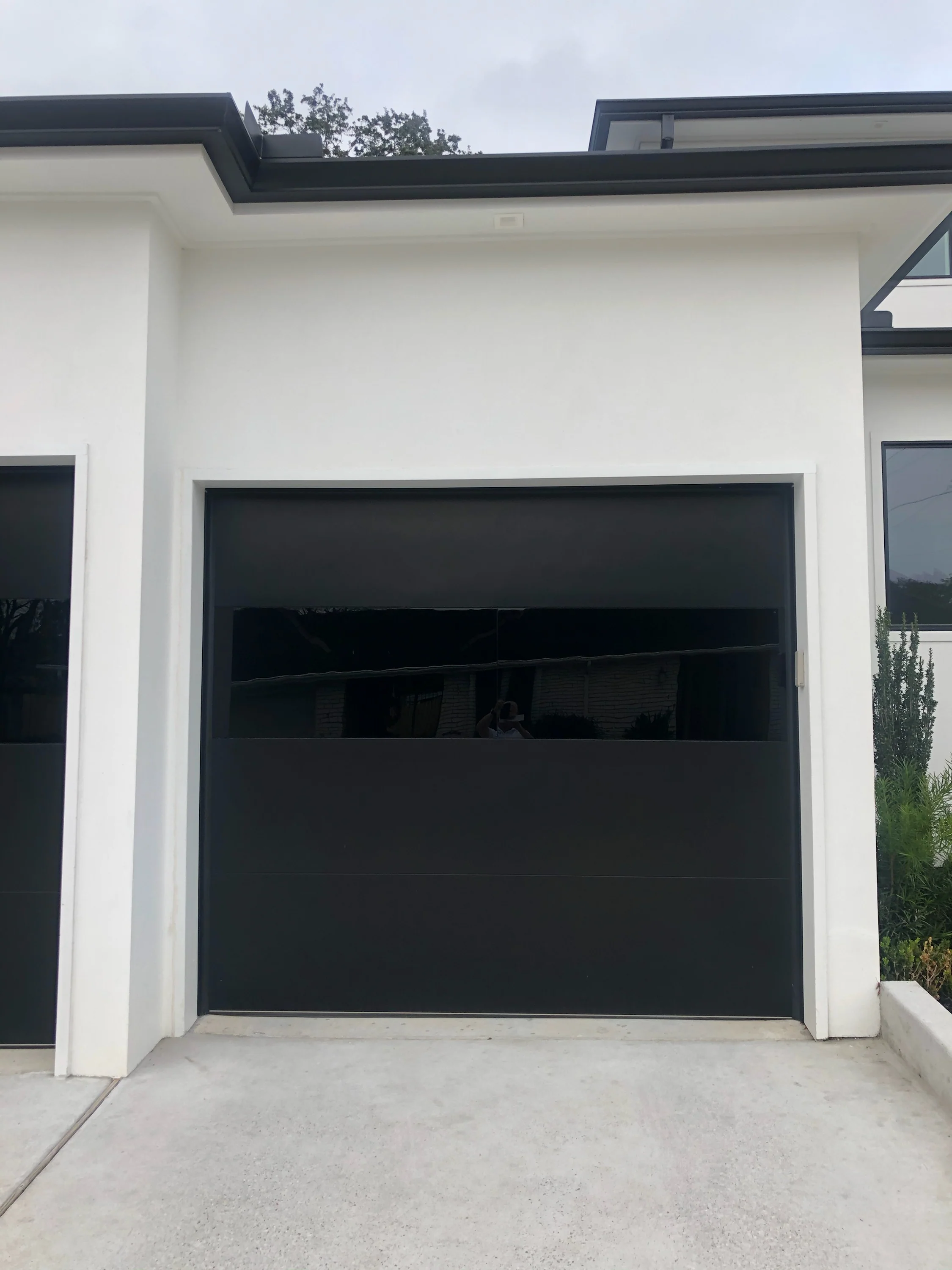Infinity - Flush Panel Smooth Steel Garage Door with Horizontal Modern Glass Modern Design - Image 16