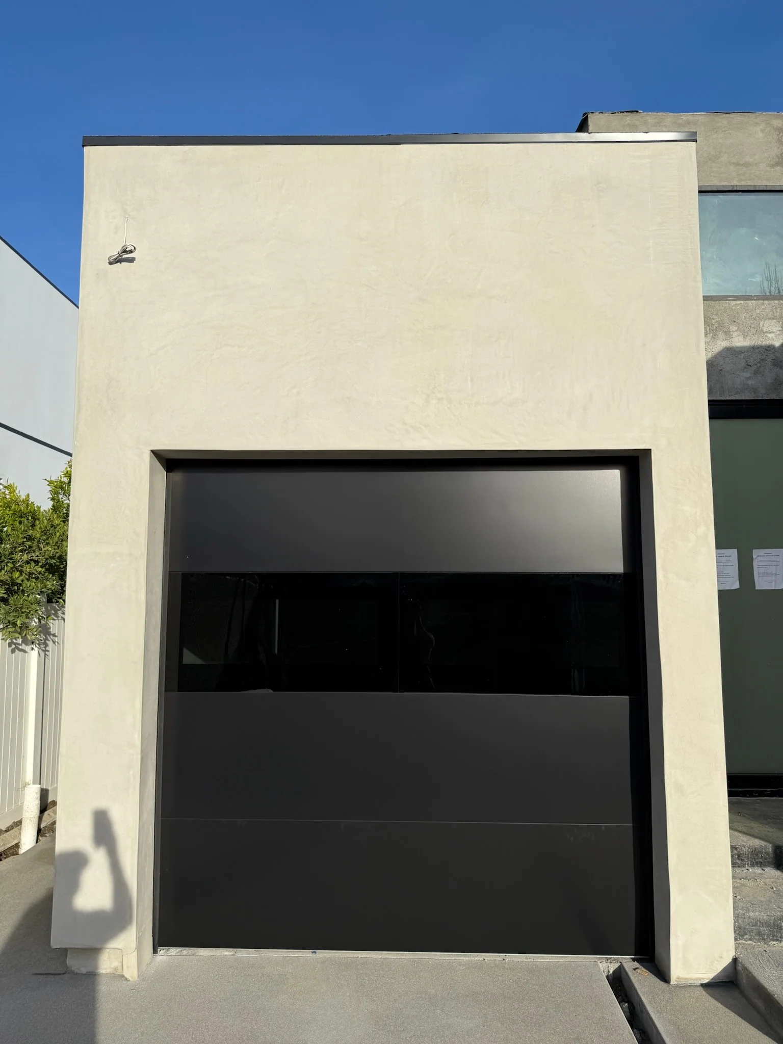 Infinity - Flush Panel Smooth Steel Garage Door with Horizontal Modern Glass Modern Design - Image 29