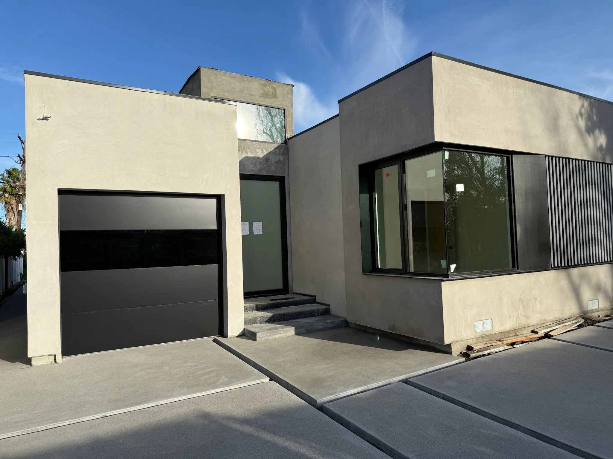 Infinity - Flush Panel Smooth Steel Garage Door with Horizontal Modern Glass Modern Design - Image 30