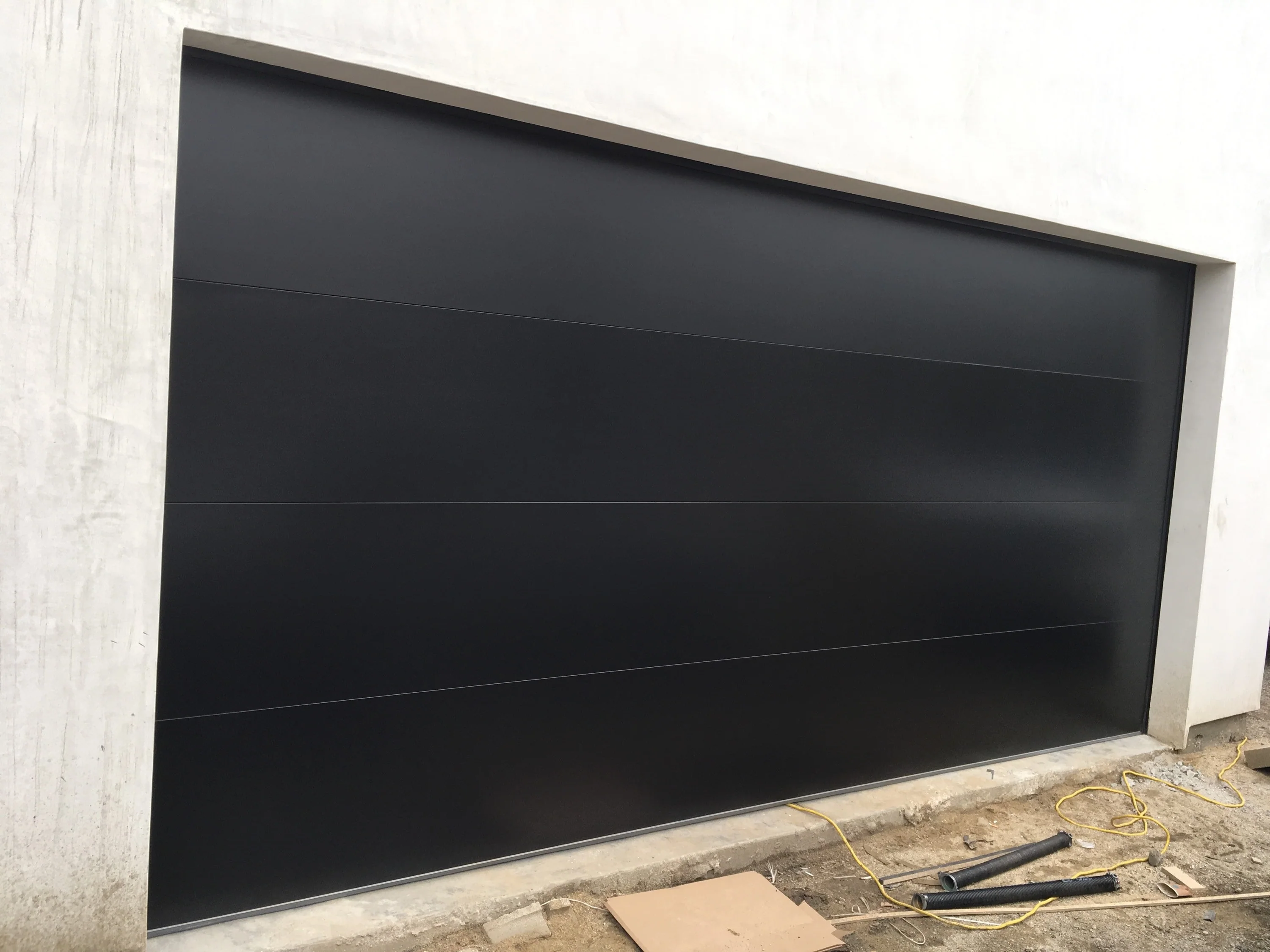 Infinity - Flush Panel Smooth Steel Garage Door with Horizontal Modern Glass Modern Design - Image 5